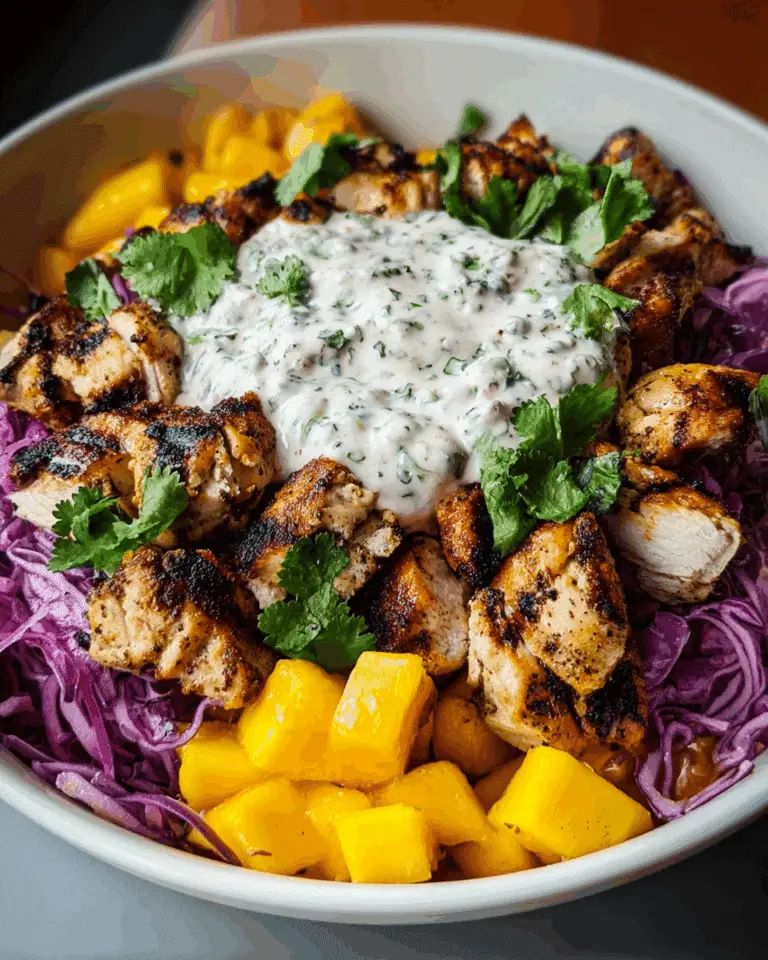 jerk chicken & mango slaw bowls with honey lime cream Recipe